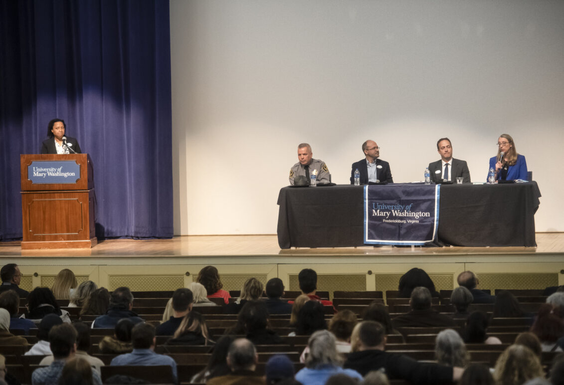 Faculty and staff panel in Dodd Auditorium.