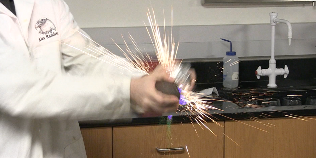 Image of chemistry experiment with sparks flying