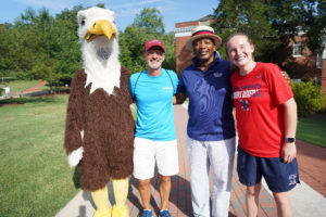 UMW mascot Sammy D. Eagle, President Troy Paino and Cedric Rucker, associate vice president and dean of Student Life, came out to help students move onto campus. Photo by Suzanne Rossi.
