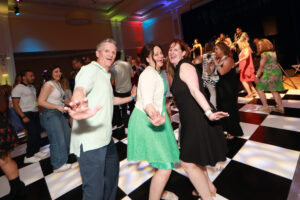 Grads get down on the dance floor at the all-class party on Saturday night. Photo by Karen Pearlman Photography.