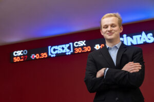 UMW business major Paul Datovech poses inside Woodard Hall, home to the College of Business.