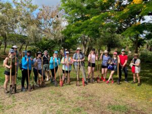 UMW students plant trees for a forest restoration project in the Galápagos Islands. For more than a decade, Sally Brannan Hurt's scholarship has helped dozens of students visit one of the most biodiverse places on the planet. Photo courtesy of Professor of Biology Andrew Dolby.