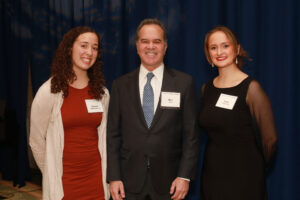 Seniors Sofia Taylor (right) and Hannah Stottlemyer, who both earned full-ride Alvey Scholarships established by Irene Piscopo Rodgers, pose with Ron Pohl, Rodgers' friend and attorney, at the 2023 Celebration of Giving. Photo by Karen Pearlman Photography.