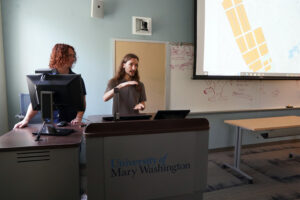 UMW students Lucas Anderson and Aidan Smagh present 'Mapping Racial Covenants in Fredericksburg' during Research and Creativity Day.