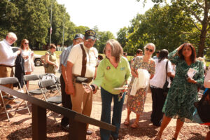 Sherman White and the City of Fredericksburg’s M.C. Morris look at one of five newly unveiled markers on the Fredericksburg Civil Rights Trail. White's sister, Gladys White Jordan, was denied admission to UMW in 1956. Instead, she attended Virginia State College in Petersburg. Photo by Karen Pearlman.
