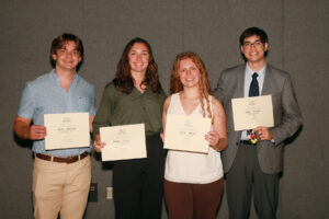 Several students earned awards from the John C. and Jerri Barden Perkins '61 College of Arts and Sciences Student Research Endowment, which will provide funding for them to continue their research during the academic year. From left: Boone Fleenor '26 (second place, poster), Morgan Hicok '25 (first place, oral presentation), Kate Green '25 (first place, poster) and Joseph Gasink '26 (second place, oral presentation). Photo by Karen Pearlman.