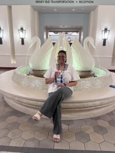 Recent UMW graduate Jaylyn Long '24 poses in Orlando after accepting the Undergraduate Rising Star Award she received from NASPA last month. The award recognizes Long's contributions during her time at Mary Washington to the field of student engagement in higher education.