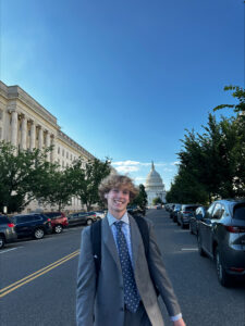 Congressional intern and UMW sophomore Adam McAninley in front of the U.S. Capitol. 