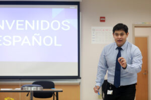 Spanish teacher Michael Arriaza, who does not use desks in his classroom, is among the full- and part-time staff at the new Academy of Technology and Innovation at UMW. Photo by Karen Pearlman.