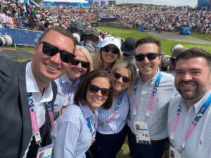 Tad Dickman '12 (far left), who majored in business administration at UMW, poses with his Olympic Golf Communications and Content Committee teammates. The group is working to put a spotlight on professional golf and its presence at the Olympics.