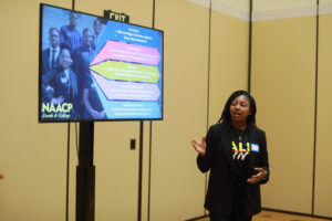 UMW senior Kaylah Lightfoot, current president of the Mary Washington NAACP Chapter, presents a presentation titled 'From the Desk to the Field' during the Virginia Student Voting Summit. Photo by Karen Pearlman.