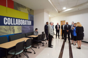 ATI-UMW Executive Director Rebecca Towery takes Virginia Secretary of Education Aimee Guidera, public officials, University administrators and members of UMW's Board of Visitors on a tour of the new lab school, which opened last month on Mary Washington's Stafford Campus. Photo by Suzanne Carr Rossi.