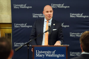 UMW Board of Visitors member Lee Murray '04 speaks at the ATI-UMW dedication ceremony. Photo by Suzanne Carr Rossi.