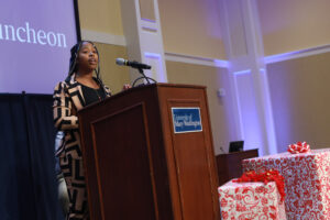 Rappahannock Scholars Program Coordinator Shanita Mitchell enthusiastically presented awards to deserving employees. Photo by Karen Pearlman.