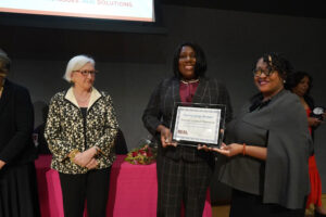 Metzger Award winner Michelle Caldwell Thompson (center) with Meta Braymer (left) and Kimberly Young (right), UMW Associate Provost of Career and Workforce, who co-chairs the colloquium. Photo by Suzanne Carr Rossi.