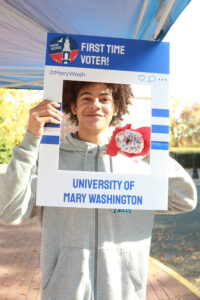 Students pose for photos on Election Day, many voting for the first time in a presidential election. Photo by Karen Pearlman.