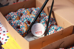 Sweet treats fuel voters and bring smiles at Day on Democracy, an Election Day tradition at UMW providing opportunities for students to get to the polls. Photo by Karen Pearlman.