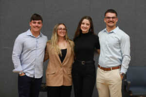 From left to right: Conner Foster, Rachel Nelson, Margarita Korsakava and Andrew McElwain, who competed under the team name 'Eagle Impact,' claimed second place in the College of Business Case Competition. Photo by Karen Pearlman.