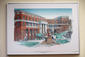 Architectural renderings like this one are part of the exhibit. Photo by Suzanne Carr Rossi.