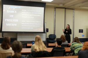 Anissa Molnar, a UMW junior majoring in international affairs and religious studies, presents the research she completed this fall during the Columns Humanities and Social Sciences Symposium. Her article - 'Have You Seen My Mahdi? Twelver Shi'ism, the Occultation of the Twelfth Imam, and the Strength of a Manufactured Figure' - is published in the current edition of Columns, Mary Washington's humanities and social sciences journal. Photo by Karen Pearlman.