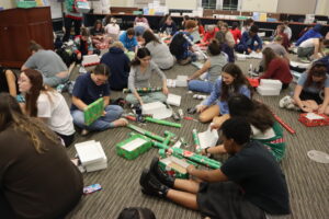 UMW students joined together at a "wrapping party" to cover gift boxes with festive paper and gaining practical skills, like event planning, along the way.