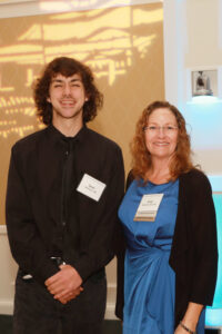 Sean McGavin '25 and his donor, Sally Brannan Hurt '92, pose for a photo at the Celebration of Giving in November 2024. The Sally Brannan Hurt '92 Study Abroad Scholarship has enabled McGavin and dozens of other UMW students to study abroad in the Galápagos Islands. Photo by Karen Pearlman.