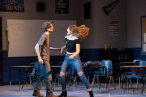 Sophomore Henry Zeigler plays Lee Turner and senior Emma Magner plays in John Proctor is the Villain. Photo by Geoff Greene.