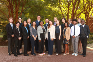 Manton (back row, right) and other members of the Student Alumni Ambassadors (SAA) pose for a photo outside the Jepson Alumni Executive Center. Manton serves as vice president of social media and marketing for the SAA program. Photo courtesy of Karen Pearlman.