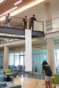 Students test their device in the “Bungee Drop” event. Photo by Karen Pearlman.