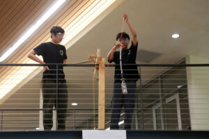 The “Bungee Drop” event, held in UMW’s Hurley Convergence Center, required participants to design elastic cords and conduct drops from given heights. Photo by Karen Pearlman.