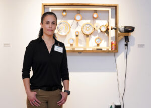 UMW alumni Shanna Aberle ’24 stands by her piece "Rotations of Remembrance"; she helped curate the exhibit alongside Garmon.