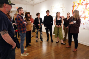 Featured artists gathered on the exhibit’s opening night in February to speak at a roundtable sharing experiences under Garmon’s tutelage.