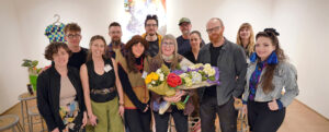 UMW Professor Emerita of Art Carole Garmon with former students, mostly alumni, who are featured in the art exhibit “The Class” housed in the duPont Gallery through March 23. Photo by Suzanne Rossi.