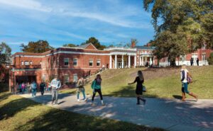 University of Mary Washington students pass by Woodard Hall on the Fredericksburg Campus. UMW's undergraduate business program was included in the prestigious 'Poets&Quants Best Undergraduate Business Schools of 2025.'