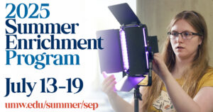 Save the Date for the 2025 Summer Enrichment Program, taking place from July 13-19. The image shows a student from a previous program working with lighting equipment in a photography class.